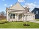 Craftsman style home with front porch and 2-car garage at 3950 Bozeman Way, Bargersville, IN 46106