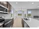 Modern kitchen with an island, stainless steel appliances, and eat-in area at 3950 Bozeman Way, Bargersville, IN 46106