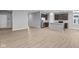 Spacious living area with hardwood floors and access to kitchen at 3950 Bozeman Way, Bargersville, IN 46106