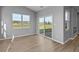 Sunroom with sliding glass doors and hardwood floors at 3950 Bozeman Way, Bargersville, IN 46106