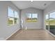 Sunroom featuring multiple windows and sliding glass doors at 3950 Bozeman Way, Bargersville, IN 46106