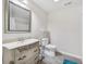 Well-lit bathroom featuring custom vanity with ornate detailing at 1038 White Oak Dr, Plainfield, IN 46168