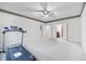 Large bedroom featuring plush carpet, a ceiling fan, and access to an attached bath and closet at 1038 White Oak Dr, Plainfield, IN 46168