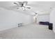 Expansive bedroom with ceiling fans, neutral carpet, and a versatile open layout at 1038 White Oak Dr, Plainfield, IN 46168
