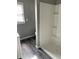 Shower and sink in updated bathroom featuring new fixtures and modern design at 2104 N Ball Ave, Muncie, IN 47304