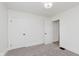 Neutral bedroom with plush carpeting, white doors, and freshly painted trim at 625 N Grant Ave, Indianapolis, IN 46201