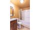 Cozy bathroom featuring a shower and tub combination and classic vanity at 14446 Chapelwood Ln, Fishers, IN 46037