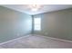 Bedroom with carpeted floor, ceiling fan and a bright window at 14446 Chapelwood Ln, Fishers, IN 46037