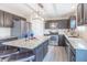 Modern kitchen featuring stainless steel appliances, granite countertops and an island at 14446 Chapelwood Ln, Fishers, IN 46037