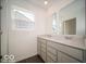A pristine bathroom with a double sink vanity, and large mirrors at 1573 Hanover St, Danville, IN 46122