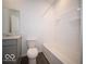 Clean, well lit bathroom with gray vanity and tiled shower/tub is perfect for a guest at 1573 Hanover St, Danville, IN 46122