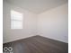 Empty bedroom with neutral paint and vinyl flooring at 1573 Hanover St, Danville, IN 46122
