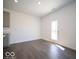 Bright dining area with modern flooring and a backyard view provides a cozy eating space at 1573 Hanover St, Danville, IN 46122