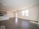 Open-concept living space with kitchen and dining areas at 1573 Hanover St, Danville, IN 46122
