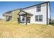 Newly built home with white siding and a dark trim, situated on a spacious lot at 1579 Hanover St, Danville, IN 46122