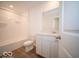 Clean bathroom features wood look floors, a bathtub and shower combo, and a vanity sink at 1579 Hanover St, Danville, IN 46122