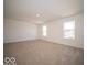Spacious bedroom with plush carpeting and plenty of natural light at 1579 Hanover St, Danville, IN 46122