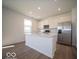 Bright kitchen with modern appliances and a spacious center island at 1579 Hanover St, Danville, IN 46122