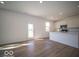 Well-lit kitchen with sleek white cabinets and a stainless steel microwave at 1579 Hanover St, Danville, IN 46122