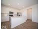 Modern kitchen featuring a large island and stainless steel appliances at 1579 Hanover St, Danville, IN 46122