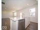 Modern kitchen island featuring stainless steel dishwasher and sink at 1579 Hanover St, Danville, IN 46122