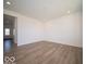 Bright living room with hardwood floors and ample space for entertaining at 1579 Hanover St, Danville, IN 46122