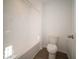 Bathroom featuring a white tub and toilet at 1585 Hanover St, Danville, IN 46122