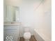 Clean bathroom with a tub, neutral color palette and ample space at 1585 Hanover St, Danville, IN 46122