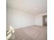 Bright bedroom with a window and plush carpeting at 1585 Hanover St, Danville, IN 46122