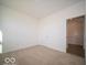 Well-lit bedroom with carpet and plenty of space, offering a cozy feel at 1585 Hanover St, Danville, IN 46122