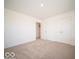 Cozy bedroom featuring a double door closet and neutral carpet at 1585 Hanover St, Danville, IN 46122