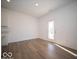 Dining area with wood floors and lots of natural light, perfect for Gathering meals at 1585 Hanover St, Danville, IN 46122