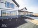 Striking two-story modern farmhouse style home with black trim and large windows at 1585 Hanover St, Danville, IN 46122