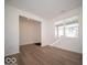 Bright living room featuring hardwood floors and ample natural light at 1585 Hanover St, Danville, IN 46122
