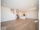 Bright and open living space with a modern kitchen and hardwood floors at 1585 Hanover St, Danville, IN 46122