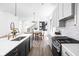 Modern kitchen boasting a large island, stainless steel appliances, and open dining space at 17366 Newton Main St, Westfield, IN 46074