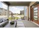 Relaxing covered patio with outdoor seating and a neighborhood view at 17366 Newton Main St, Westfield, IN 46074
