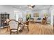 Charming dining area features hardwood floors, stylish decor, and plenty of natural light at 2227 Hidden Orchard Ct, Indianapolis, IN 46228