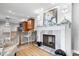 Living space featuring a fireplace, bar seating and decor accents at 2227 Hidden Orchard Ct, Indianapolis, IN 46228