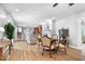 Open living space is adorned with neutral tones, elegant furnishings, and hardwood floors at 2227 Hidden Orchard Ct, Indianapolis, IN 46228