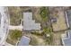 Aerial view of the property, showcasing the house, driveway, and landscaping at 1024 N Michigan St, Greenfield, IN 46140