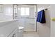 Walk-in shower with glass doors, a heated towel rack and white cabinets at 1024 N Michigan St, Greenfield, IN 46140