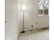 Bedroom with carpeting, white walls, a window, and a floor lamp at 1024 N Michigan St, Greenfield, IN 46140