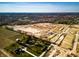 Aerial view of new home community during construction surrounded by nature at 15468 Streamwood Dr, Fishers, IN 46037