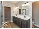 Modern bathroom featuring double sinks at 15468 Streamwood Dr, Fishers, IN 46037