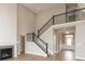 Spacious foyer featuring staircase with black iron spindles at 15468 Streamwood Dr, Fishers, IN 46037