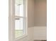 Bright and airy living room with large windows and detailed trim work at 15468 Streamwood Dr, Fishers, IN 46037