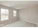 Bedroom featuring two windows and plush carpet at 1019 Cyprian Way, Lebanon, IN 46052
