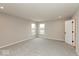 Spacious bedroom with soft carpet and double windows, filled with natural light at 1019 Cyprian Way, Lebanon, IN 46052
