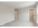 Spacious bedroom featuring neutral walls, plush carpet, a walk-in closet, and natural light at 1019 Cyprian Way, Lebanon, IN 46052